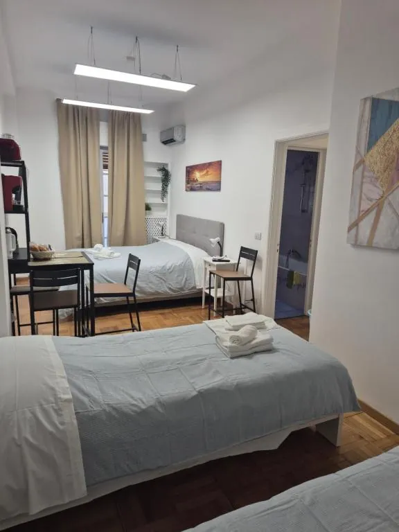 Camera quadrupla deluxe, letti – B&B Sparano 103, Via Sparano, Bari centro